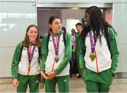 9 July 2018; Team Ireland athletes, from left, Sarah Healy, Blackrock AC, Dublin, with her gold medals for winning the Girls 1500m and 3000m events, Sophie O'Sullivan, Ballymore Cobh AC, Cork, with her silver medal she won in the Girls 800m event, and Rhasidat Adeleke, Tallaght AC, Dublin, with her gold medal for winning the Girls 200m event, during the Team Ireland homecoming from the European Athletics Under-18 Championships in Gyor, Hungary, at Dublin Airport in Dublin. Photo by Piaras Ó Mídheach/Sportsfile