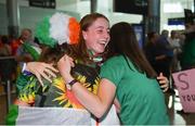 9 July 2018; Ireland's Sarah Healy, Blackrock AC, Dublin, with her gold medals for winning the Girls 1500m and 3000m events, is welcomed home by some of her friends during the Team Ireland homecoming from the European Athletics Under-18 Championships in Gyor, Hungary, at Dublin Airport in Dublin. Photo by Piaras Ó Mídheach/Sportsfile