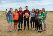 10 July 2018; Johnny Coen of Galway with Grace Rodgers, Rena Conneely, Aisling Mullen, Aoife Guildea, Lauren Rodgers, Jessica Boland, and Cleonna Dillane from Inis Mór, Co. Galway, during a visit to Aran Islands GAA club prior to the GAA Hurling and Football All Ireland Senior Championship Series National Launch at the Aran Islands, Co Galway. Photo by Diarmuid Greene/Sportsfile