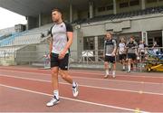 11 July 2018; Dundalk team captain Brian Gartland makes his way onto the pitch with his team-mates before training at the Kadriorg Stadium in Tallinn, Estonia. Photo by Matt Browne/Sportsfile
