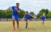 12 July 2018; Adam Byrne of Leinster with camp participants during the Bank of Ireland Leinster Rugby Summer Camp - Greystones RFC at Greystones RFC in Greystones, Co Wicklow. Photo by Brendan Moran/Sportsfile