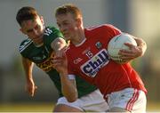 29 June 2018; Damien Gore of Cork in action against Micheál Reidy of Kerry during the EirGrid Munster GAA Football U20 Championship Final match between Kerry and Cork at Austin Stack Park in Tralee, Kerry. Photo by Piaras Ó Mídheach/Sportsfile