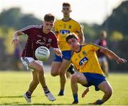 13 July 2018; Matthew Cooley of Galway in action against Robbie Dolan of Roscommon during the Electric Ireland Connacht GAA Minor Championship Final match between Roscommon and Galway at Dr Hyde Park in Roscommon. Photo by Matt Browne/Sportsfile