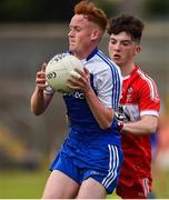 13 July 2018; Ronan Grimes of Monaghan in action against Conleth McGuckian of Derry during the Electric Ireland Ulster GAA Football Minor Championship Final match between Derry and Monaghan at the Athletic Grounds, Armagh. Photo by Oliver McVeigh/Sportsfile