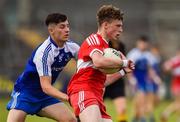 13 July 2018; Enda Downey of Derry in action against Christopher Flood of Monaghan during the Electric Ireland Ulster GAA Football Minor Championship Final match between Derry and Monaghan at the Athletic Grounds, Armagh. Photo by Oliver McVeigh/Sportsfile