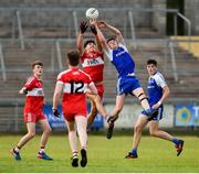 13 July 2018; Sean Jones of Monaghan in action against Jarleth Donaghy of Derry during the Electric Ireland Ulster GAA Football Minor Championship Final match between Derry and Monaghan at the Athletic Grounds, Armagh. Photo by Oliver McVeigh/Sportsfile