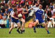 13 July 2018; Ethan Doherty of Derry in action against Brendan Óg O Dufaigh, behind, and Donnach Swinburne of Monaghan during the Electric Ireland Ulster GAA Football Minor Championship Final match between Derry and Monaghan at the Athletic Grounds, Armagh. Photo by Oliver McVeigh/Sportsfile