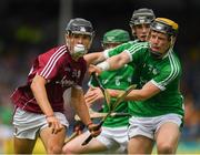 8 July 2018; Dean Reilly of Galway in action against Ben Herlihy of Limerick during the Electric Ireland GAA Hurling All-Ireland Minor Championship Quarter-Final match between Galway and Limerick at Semple Stadium in Thurles, Co Tipperary. Photo by Ray McManus/Sportsfile