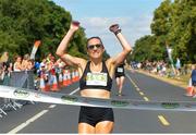 14 July 2018; First female finisher, Caitriona Jennings of Letterkenny AC, crosses the line during the Irish Runner 10 Mile at Phoenix Park in Dublin. Photo by Eoin Smith/Sportsfile