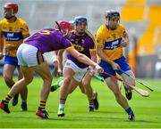 14 July 2018; Tony Kelly of Clare in action against Paudie Foley of Wexford during the GAA Hurling All-Ireland Senior Championship Quarter-Final match between Clare and Wexford at Páirc Ui Chaoimh in Cork. Photo by Brendan Moran/Sportsfile