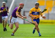 14 July 2018; David Reidy of Clare in action against Diarmuid O'Keeffe of Wexford during the GAA Hurling All-Ireland Senior Championship Quarter-Final match between Clare and Wexford at Páirc Ui Chaoimh in Cork. Photo by Brendan Moran/Sportsfile