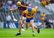 14 July 2018; Shane O'Donnell of Clare in action against Damien Reck of Wexford during the GAA Hurling All-Ireland Senior Championship Quarter-Final match between Clare and Wexford at Páirc Ui Chaoimh in Cork. Photo by Brendan Moran/Sportsfile