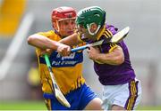 14 July 2018; Shaun Murphy of Wexford in action against John Conlon of Clare during the GAA Hurling All-Ireland Senior Championship Quarter-Final match between Clare and Wexford at Páirc Ui Chaoimh in Cork. Photo by Brendan Moran/Sportsfile
