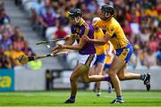 14 July 2018; Jack O'Connor of Wexford in action against Cathal Malone of Clare during the GAA Hurling All-Ireland Senior Championship Quarter-Final match between Clare and Wexford at Páirc Ui Chaoimh in Cork. Photo by Brendan Moran/Sportsfile