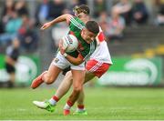 14 July 2018; Colm Moran of Mayo in action against Seán McKeever of Derry during the EirGrid GAA Football All-Ireland U20 Championship Semi-Final match between Mayo and Derry at Páirc Seán Mac Diarmada, in Carrick-on-Shannon. Photo by Piaras Ó Mídheach/Sportsfile