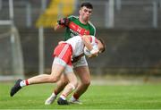 14 July 2018; Oisín McWilliams of Derry in action against Ross Egan of Mayo during the EirGrid GAA Football All-Ireland U20 Championship Semi-Final match between Mayo and Derry at Páirc Seán Mac Diarmada, in Carrick-on-Shannon. Photo by Piaras Ó Mídheach/Sportsfile