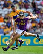 14 July 2018; Jack O'Connor of Wexford is tackled by Cathal Malone of Clare during the GAA Hurling All-Ireland Senior Championship Quarter-Final match between Clare and Wexford at Páirc Ui Chaoimh in Cork. Photo by Brendan Moran/Sportsfile