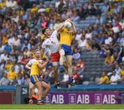 14 July 2018; Cathal Compton of Roscommon and Pádraig Hampsey of Tyrone jump highest for this dropping ball  during the GAA Football All-Ireland Senior Championship Quarter-Final Group 2 Phase 1 match between Tyrone and Roscommon at Croke Park in Dublin. Photo by Ray McManus/Sportsfile
