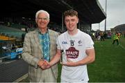 14 July 2018; Jimmy Hyland of Kildare is presented with his EirGrid Man of the Match award by John O'Connor, Chairman of EirGrid, following the EirGrid GAA Football U20 All-Ireland Semi-Final match between Kildare and Kerry at Gaelic Grounds, Limerick. Photo by Ray Ryan/Sportsfile