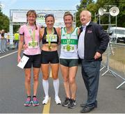 14 July 2018; Race participants, from left, second place Karen Alexander, first female finisher Catriona Jennings of Letterkenny AC, Tara Kennedy of Raheny Shamrock AC, with Frank Greally of Irish Runner following the Irish Runner 10 Mile at Phoenix Park in Dublin. Photo by Eoin Smith/Sportsfile