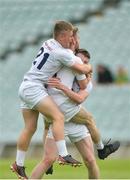 14 July 2018; Kildare players Jack Barrett, Stephen Comerford and Jason Gibbons celebrate after beating Kerry in the EirGrid GAA Football All-Ireland U20 Championship Semi-Final match between Kildare and Kerry at the Gaelic Grounds, Limerick. Photo by Ray Ryan/Sportsfile