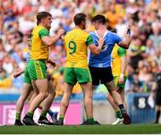 14 July 2018; Leo McLoone and Hugh McFadden of Donegal tussle with Michael Darragh Macauley of Dublin during the GAA Football All-Ireland Senior Championship Quarter-Final Group 2 Phase 1 match between Dublin and Donegal at Croke Park in Dublin. Photo by David Fitzgerald/Sportsfile