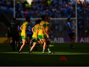 14 July 2018; Donegal players run onto the pitch for a team photo prior to the GAA Football All-Ireland Senior Championship Quarter-Final Group 2 Phase 1 match between Dublin and Donegal at Croke Park, in Dublin. Photo by David Fitzgerald/Sportsfile