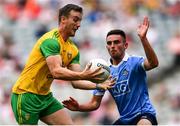14 July 2018; Leo McLoone of Donegal in action against Niall Scully of Dublin during the GAA Football All-Ireland Senior Championship Quarter-Final Group 2 Phase 1 match between Dublin and Donegal at Croke Park in Dublin. Photo by David Fitzgerald/Sportsfile