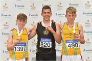14 July 2018; Boys under-14 Javelin, from left Oisin Joyce, of Lake District Athletics Co. Mayo with his Silver medal, along with Karlis Kaugars of Dunleer A.C. Co. Louth with his gold medal, centre, and with a championship best throw of 55.63m, and Diarmuid Duffy, also from Lake District Athletics Co. Mayo, with his bronze medal, pictured during the Irish Life Health National T&F Juvenile Day one at Tullamore Harriers Stadium, in Tullamore, Co. Offaly. Photo by Matt Browne/Sportsfile  *** Local Caption *** Karlis Kaugars from Dunleer A.C. Co. Louth, centre, after winning the n with a championship best throw of 55.63m
