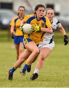 15 July 2018; Sarah McVeigh of Roscommon in action against Lara Gilbert of Kildare during the All-Ireland Ladies Football Minor B final match between Kildare and Roscommon at Moate, Westmeath. Photo by Oliver McVeigh/Sportsfile