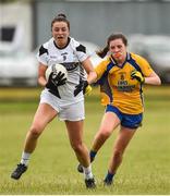 15 July 2018; Lara Curran of Kildare in action against Sarah McVeigh of Roscommon during the All-Ireland Ladies Football Minor B final match between Kildare and Roscommon at Moate, Westmeath. Photo by Oliver McVeigh/Sportsfile