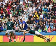15 July 2018; Conor McManus of Monaghan kicks a point ahead of David Hyland of Kildare during the GAA Football All-Ireland Senior Championship Quarter-Final Group 1 Phase 1 match between Kildare and Monaghan at Croke Park, Dublin. Photo by David Fitzgerald/Sportsfile