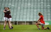 15 July 2018; Chelsie Crowe, left, and Aoife Thompson of Galway celebrate at the final whistle as Rachel Murphy of Cork shows her disappointment after the All-Ireland Ladies Football Minor A final between Galway and Cork at the Gaelic Grounds, Limerick. Photo by Diarmuid Greene/Sportsfile