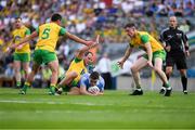 14 July 2018; Referee Conor Lane looks on as Brian Fenton of Dublin is surrounded by Donegal players Frank McGlynn, 5, Michael Murphy and Ciarán Thompson, right, during the GAA Football All-Ireland Senior Championship Quarter-Final Group 2 Phase 1 match between Dublin and Donegal at Croke Park in Dublin.  Photo by Ray McManus/Sportsfile