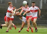 14 July 2018; Colm Moran of Mayo shoots under pressure from Declan Cassidy, left, and Shea Downey of Derry during the EirGrid GAA Football All-Ireland U20 Championship Semi-Final match between Mayo and Derry at Páirc Seán Mac Diarmada, in Carrick-on-Shannon. Photo by Piaras Ó Mídheach/Sportsfile