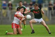 14 July 2018; Ben McCarron of Derry in action against John Cunnane of Mayo during the EirGrid GAA Football All-Ireland U20 Championship Semi-Final match between Mayo and Derry at Páirc Seán Mac Diarmada, in Carrick-on-Shannon. Photo by Piaras Ó Mídheach/Sportsfile