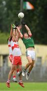 14 July 2018; Evan O'Brien of Mayo in action against Conor Doherty, centre, and Mark McGrogan of Derry during the EirGrid GAA Football All-Ireland U20 Championship Semi-Final match between Mayo and Derry at Páirc Seán Mac Diarmada, in Carrick-on-Shannon. Photo by Piaras Ó Mídheach/Sportsfile