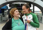 16 July 2018; Ireland's Ciara Neville of Emerald AC, Co Limerick, with her silver medal won in the women’s 4x100m relay team event, is greeted by her grandmother Maura McCutcheon during the Team Ireland homecoming from the IAAF World U20 Athletics Championships in Tampere, Finland, at Dublin Airport in Dublin. Photo by Piaras Ó Mídheach/Sportsfile