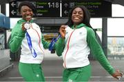 16 July 2018; Ireland's Patience Jumbo-Gula of St Gerard’s AC, Dundalk, Co Louth, left, and Gina Akpe-Moses of Blackrock AC, Co Louth, with their silver medals won in the women’s 4x100m relay team event during the Team Ireland homecoming from the IAAF World U20 Athletics Championships in Tampere, Finland, at Dublin Airport in Dublin. Photo by Piaras Ó Mídheach/Sportsfile