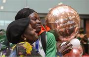 16 July 2018; Ireland's Rhasidat Adeleke of Tallaght AC, Co Dublin, winner of a silver medal in the women’s 4x100m relay team event, with her mother Ade, during the Team Ireland homecoming from the IAAF World U20 Athletics Championships in Tampere, Finland, at Dublin Airport in Dublin. Photo by Piaras Ó Mídheach/Sportsfile