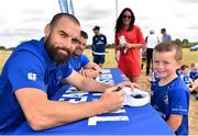 17 July 2018; Scott Campbell, age 4, from Rathtoe, Tullow, Co. Carlow, has his hat signed by Leinster's Scott Fardy during the Bank of Ireland Leinster Rugby Summer Camp at Tullow RFC, in Roscat, Tullow, Co. Carlow. Photo by Seb Daly/Sportsfile