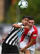 17 July 2018; Ayoze Perez of Newcastle United in action against Kevin Toner of St Patrick's Athletic during the friendly match between St Patrick’s Athletic and Newcastle United at Richmond Park in Inchicore, Dublin. Photo by Sam Barnes/Sportsfile
