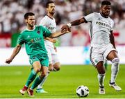 17 July 2018: William Remy of Legia Warsaw in action against Jimmy Keohane of Cork City during the UEFA Champions League 1st Qualifying Round Second Leg match between Legia Warsaw and Cork City at the Polish Army Stadium in Warsaw, Poland. Photo by Lukasz Grochala/Sportsfile