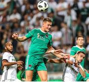 17 July 2018: Sean McLoughlin of Cork City in action against Marko Vesovic of Legia Warsaw during the UEFA Champions League 1st Qualifying Round Second Leg match between Legia Warsaw and Cork City at the Polish Army Stadium in Warsaw, Poland. Photo by Lukasz Grochala/Sportsfile