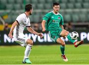 17 July 2018: Jimmy Keohane of Cork City in action against Inaki Astiz of Legia Warsaw during the UEFA Champions League 1st Qualifying Round Second Leg match between Legia Warsaw and Cork City at the Polish Army Stadium in Warsaw, Poland. Photo by Lukasz Grochala/Sportsfile
