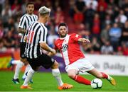 17 July 2018; Killian Brennan of St Patrick's Athletic slides in to tackle Matt Ritchie of Newcastle United during the friendly match between St Patrick’s Athletic and Newcastle United at Richmond Park in Inchicore, Dublin. Photo by Sam Barnes/Sportsfile