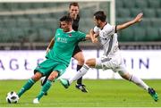 17 July 2018: Graham Cummins of Cork City in action against Inaki Astiz of Legia Warsaw during the UEFA Champions League 1st Qualifying Round Second Leg match between Legia Warsaw and Cork City at the Polish Army Stadium in Warsaw, Poland. Photo by Lukasz Grochala/Sportsfile