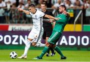 17 July 2018: Carlos Daniel Lopez Huesca of Legia Warsaw in action against Ronan Coughlan of Cork City during the UEFA Champions League 1st Qualifying Round Second Leg match between Legia Warsaw and Cork City at the Polish Army Stadium in Warsaw, Poland. Photo by Lukasz Grochala/Sportsfile