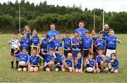 18 July 2018; Leinster player's Bryan Byrne and Peter Dooley with Yvonne Palmer, from Bank of Ireland, Leinster camp coach Paul Brady and children from the summer camp during the Bank of Ireland Leinster Rugby Summer Camp at Portlaoise RFC in Togher, Portlaoise, Co. Laois. Photo by Matt Browne/Sportsfile