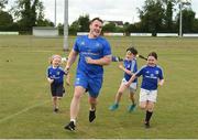 18 July 2018; Leinster player Peter Dooley with children from the Bank of Ireland Leinster Rugby Summer Camp at Portlaoise RFC in Togher, Portlaoise, Co. Laois. Photo by Matt Browne/Sportsfile